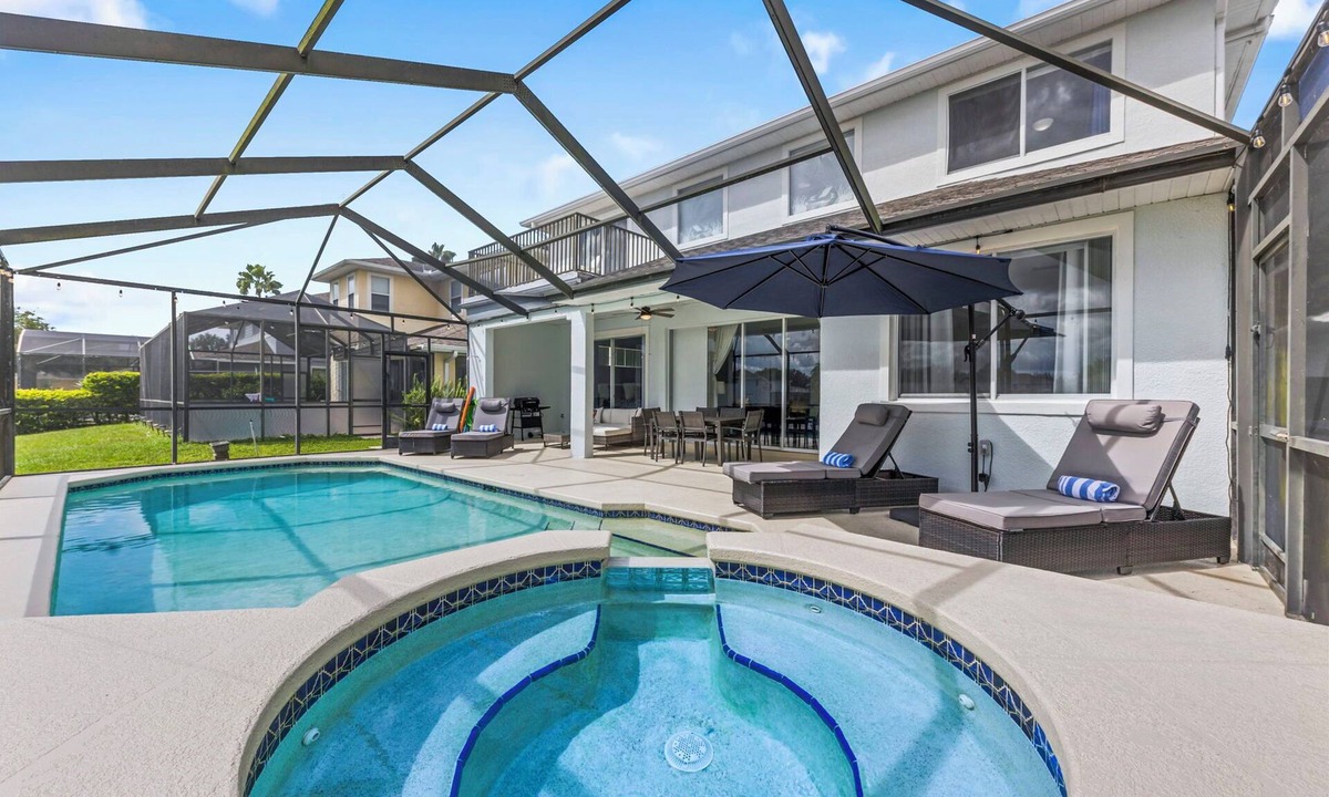 Sunset Lakes House | 5 bed pool home, south facing lake views, 5 mins to Walt Disney World® Resort!