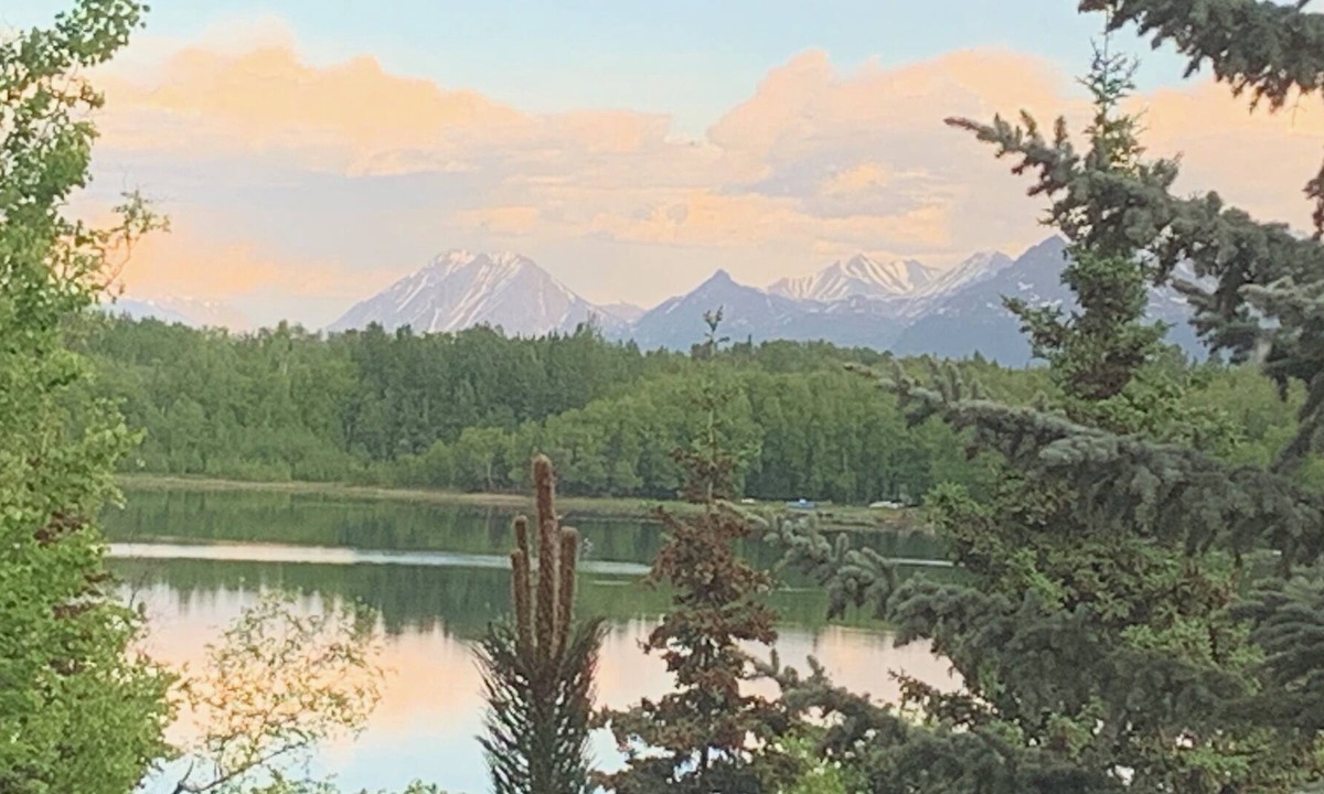 Tanaina Cabin | Custom built modern cabin with a loft on a lake with mountain views.