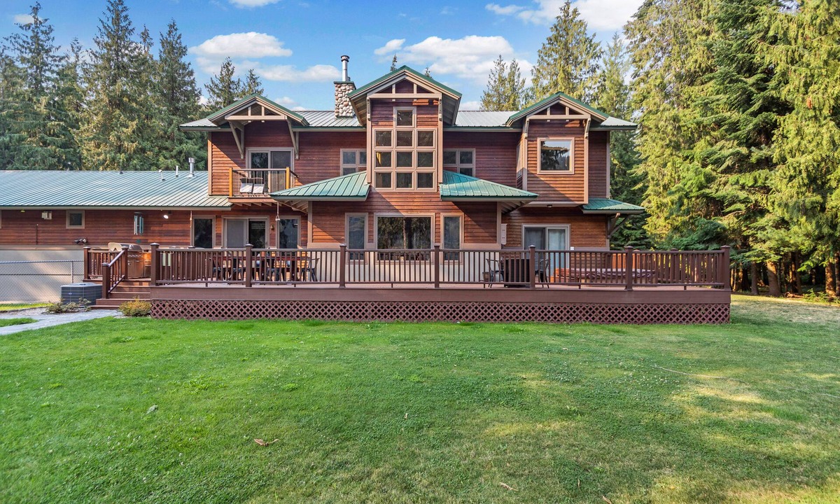 Clark Fork House | Expansive Riverfront Lodge with Dock, Game Room, Bar & Spacious Deck!