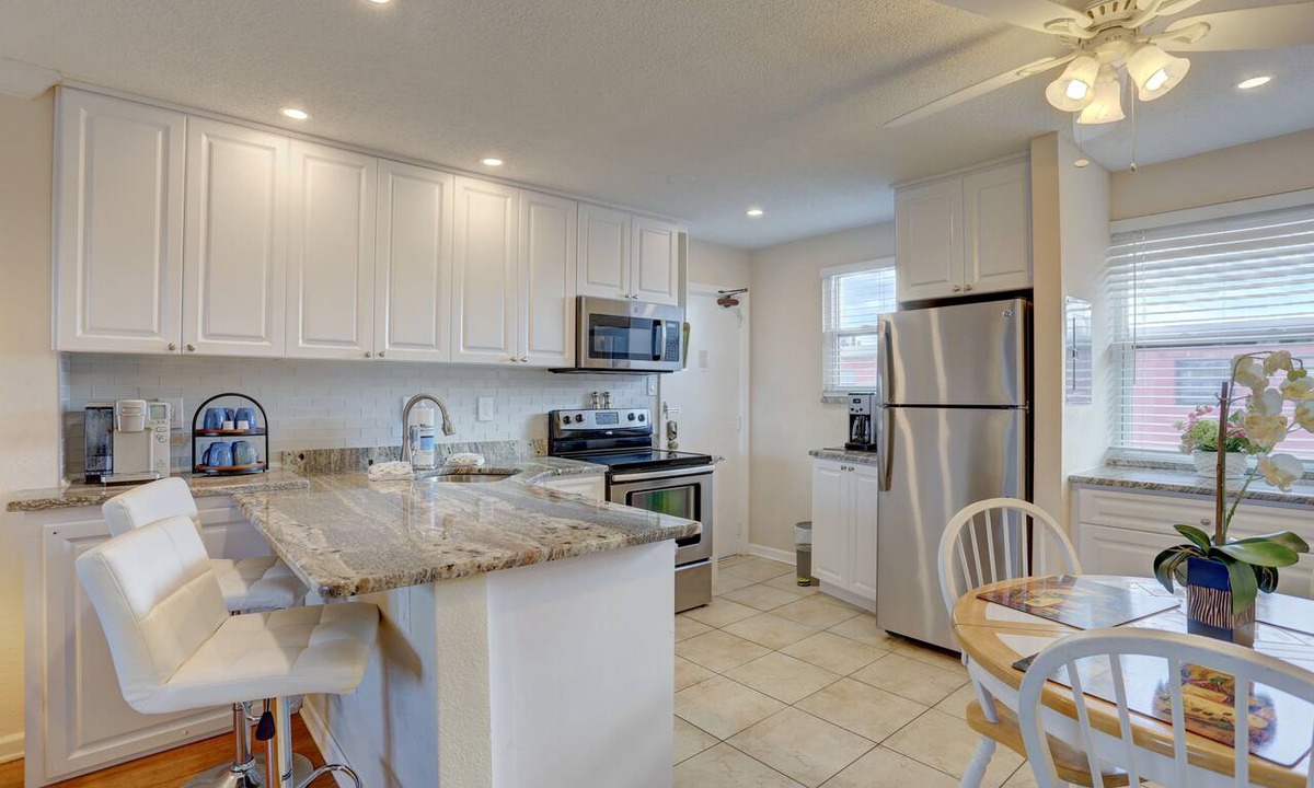 St. Pete Beach Condo | 🌿 Gulf Winds #606 — Garden-View Comfort with Stylish Updates & Steps to Upham Beach