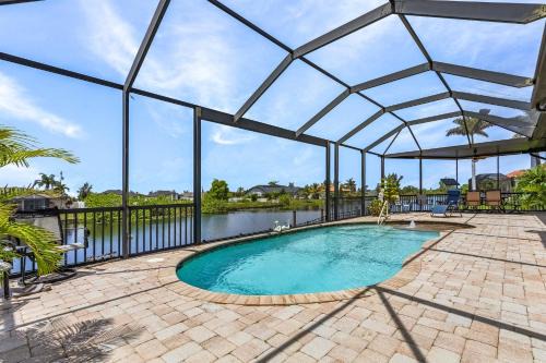 Burnt Store House | Heated Pool, Game Room, & Dock on Freshwater Canal - Mermaid Cove - Roelens