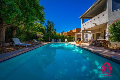 Northeast Heights House | Pueblo Moon w Pool - An Irvie Home