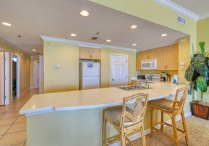 Sizable condo w/private balcony & gulf views - located right on the beach