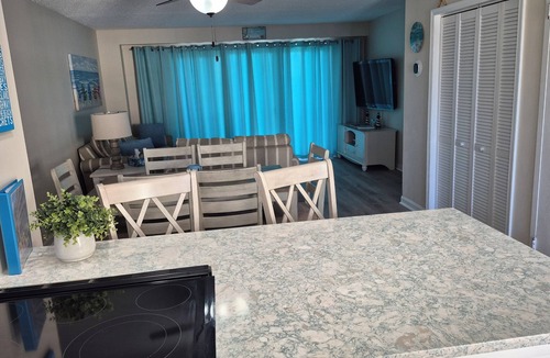 Midtown Ocean City Condo | BAY FRONT - Beautiful Sunsets - Walking distance to Beach, Shops, Eateries.