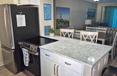 Midtown Ocean City Condo | BAY FRONT - Beautiful Sunsets - Walking distance to Beach, Shops, Eateries.