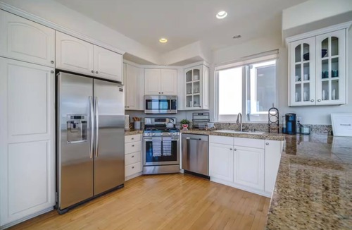 The Strand House | Beach Townhome with Ocean Views, Sleeps 6, Garage Parking Space