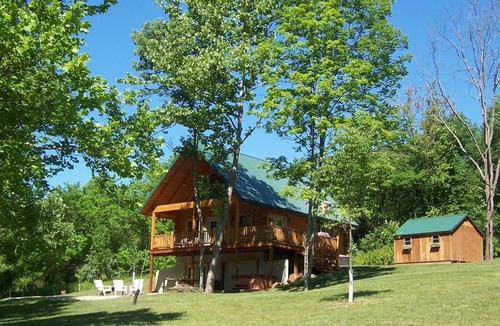 Blue Rock Cabin | Beautiful Secluded Deluxe Log Cabin Overlooking Stocked Pond