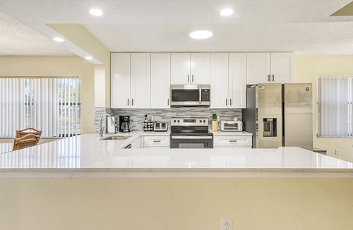 Trailer Estates Condo | BRIGHT, BEAUTIFULLY UPGRADED FIRST FLOOR END-UNIT AT SHOREWALK