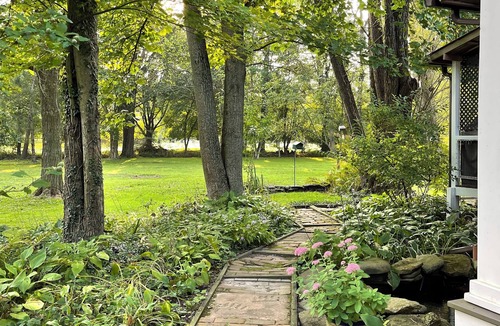 Bellville Cabin | Cabin By The Creek nestled on 3 acres with a hot tub in welcoming Bellville