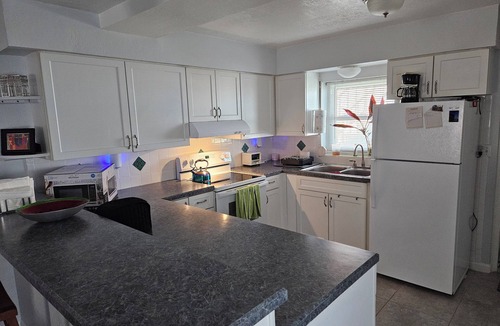 Titusville Condo | Charming 2-bedroom condo in delightful Titusville wth WiFi AC, pool laundry room