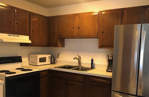 Maple Heights Apartment | Classic Elegance with Assigned Parking