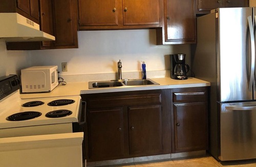 Maple Heights Apartment | Classic Elegance with Assigned Parking