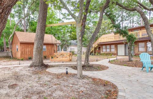 Gulf Breeze Apartment | Cozy Bayfront Log Cabin! Fishing Pier, Swim Dock!
