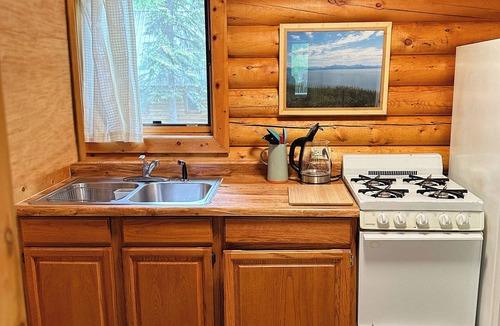 Wasilla Cabin | Cozy Cabin on wooded property.