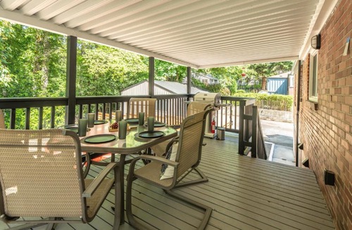 Victory Heights House | Creekside Deck Covered BBQ Fire Pit King Bed