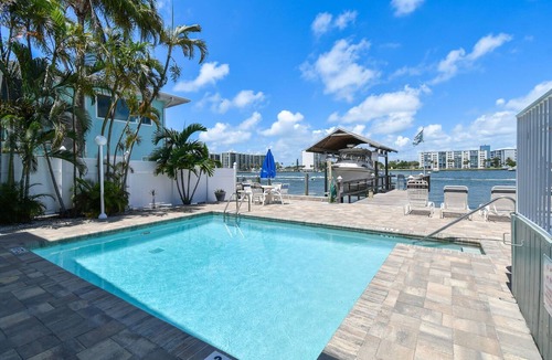 Bay Esplanade Apartment | Enchanted Inn Suite #3: Waterfront, Pool, Fishing Dock, Boat Docks & Tiki Bar!