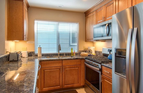 West Newport Condo | Enjoy Ocean Views from the Large Roof-Top Deck Adjacent to the Newport Pier!