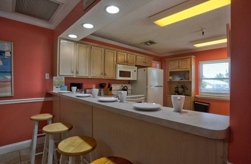Madeira Beach Condo | Fantastic Beachfront Resort. Roomy and Comfortable. Take a Stroll along Beach or Lounge at the Pool.