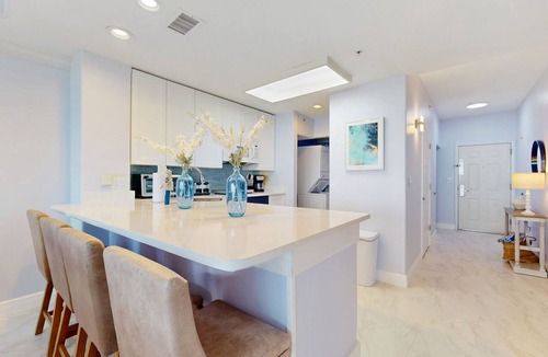 Florida Central Atlantic Coast Condo | Lakefront retreat near attractions with lake view, AC, WiFi, pool, hot tub & gym