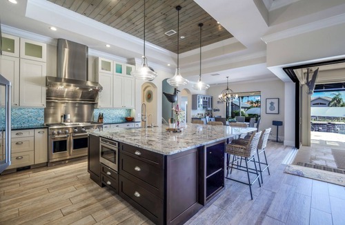 Cape Harbour House | Lux 5BR/4BA South-Facing Waterfront/Pool, Hot Tub, Dock & Dual Master Suites