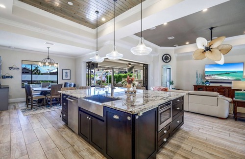 Cape Harbour House | Lux 5BR/4BA South-Facing Waterfront/Pool, Hot Tub, Dock & Dual Master Suites