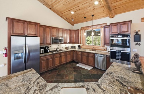 Castle Glen Estates Cabin | Luxury in Castle Glen! HOT TUB! Game Room with Pool Table! Lake Views! Multiple Decks and Fireplaces!