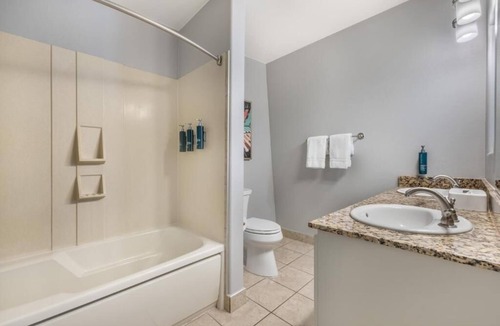 Canyon Corridor Hotel | Modern Suite with Private Balcony and Gorgeous Pool Views for Relaxation