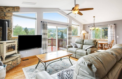 Willow Grove House | Mountain view home with private hot tub, fireplace, charming interior & deck