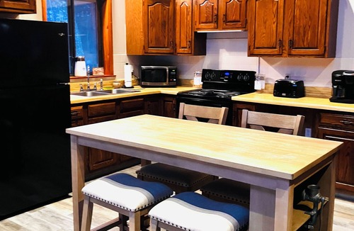 Fort Ann House | nEnjoy the peaceful wilderness from the comfort of this cozy Adirondack home.