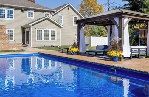 Northwest Columbus House | Pool, Oasis, Outdoor fire, 2 King bed suites, Theater, Workout room, Playground