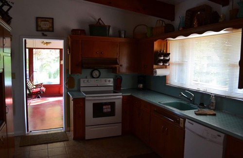 Glouster House | Secluded 5 BR brick ranch with a panoramic view of the lake through the trees