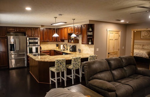 Nashport Cabin | Secluded Cabins on Private Stocked Pond Hot Tub. Ping Pong. Arcade. Master Suite