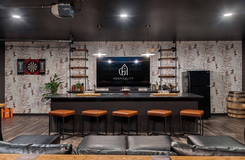 Logan House | The Distillery + Golf Simulator l Hot Tub