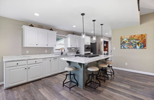 Chappells House | Waterfront Lake Greenwood. King beds. Hot tub. Pellet grill