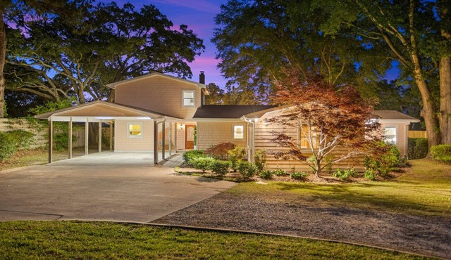 A charming 4-bedroom waterfront with a private dock retreat that offers a secluded serene getaway!