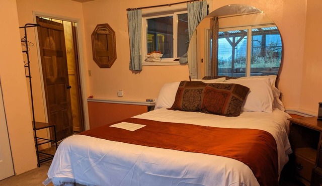 Bed and a twin bed, bedroom individual, entrance and exit to private beach