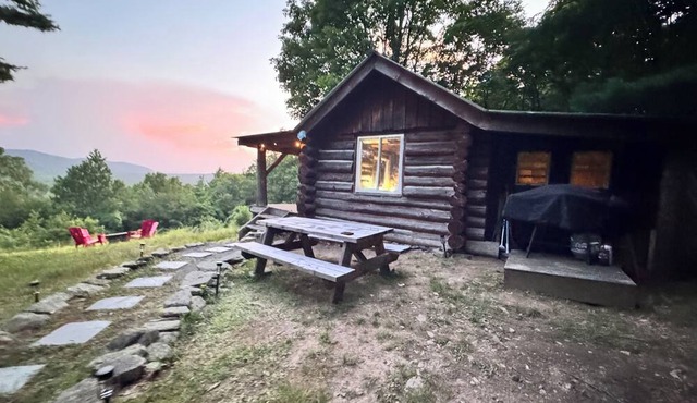 Marvelous Off-Grid Log Cabin Getaway on Working Horse Ranch.