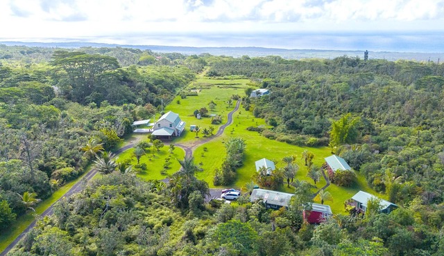 Ocean View Estate with private hiking trail and volcanically heated hot tubs.
