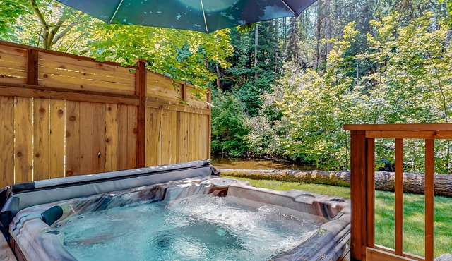 Riverfront property with three cabins, hot tubs, firepits, kayaks - beach access