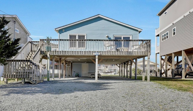 Steps to the beach. Canal front with new dock. Clean, Cozy Getaway.