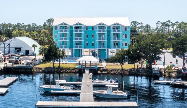 WATERFRONT, RIVERS EDGE CONDO #2C-BLDG 1* PRIVATE DOCK and ASSIGNED BOAT SLIP!