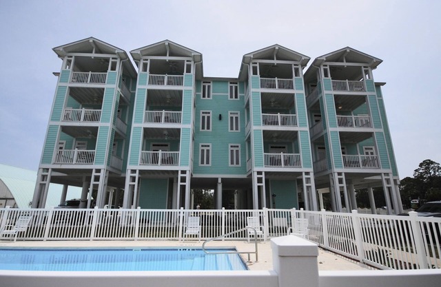 Waterfront, Rivers Edge Condo #1C-Bldg 1 *PRIVATE DOCK and ASSIGNED BOAT SLIP!