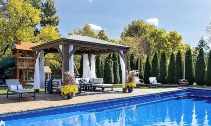 Northwest Columbus House | Pool, Oasis, Outdoor fire, 2 King bed suites, Theater, Workout room, Playground